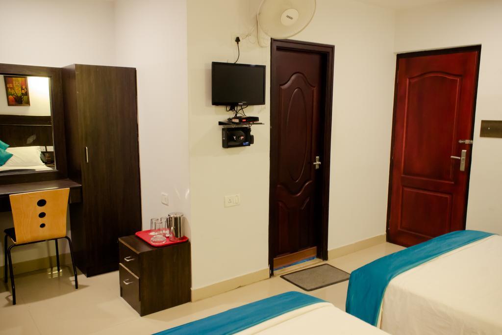 The Signature Inn Μπανγκαλόρ Δωμάτιο φωτογραφία
