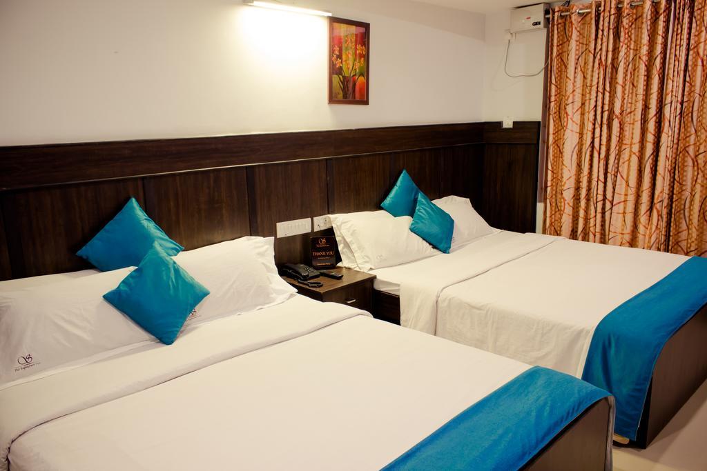 The Signature Inn Μπανγκαλόρ Δωμάτιο φωτογραφία