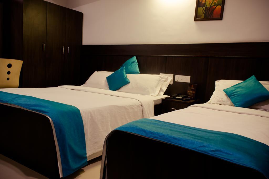 The Signature Inn Μπανγκαλόρ Δωμάτιο φωτογραφία