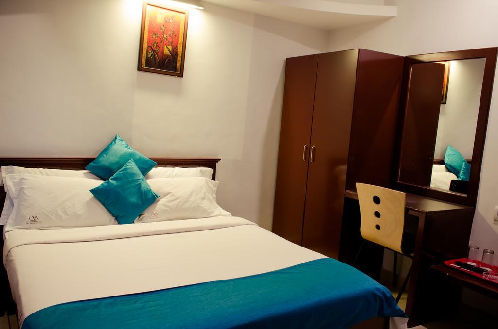 The Signature Inn Μπανγκαλόρ Δωμάτιο φωτογραφία