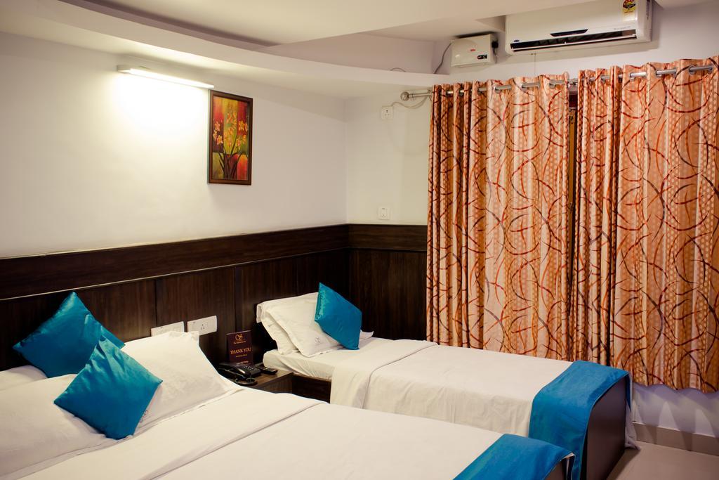The Signature Inn Μπανγκαλόρ Δωμάτιο φωτογραφία