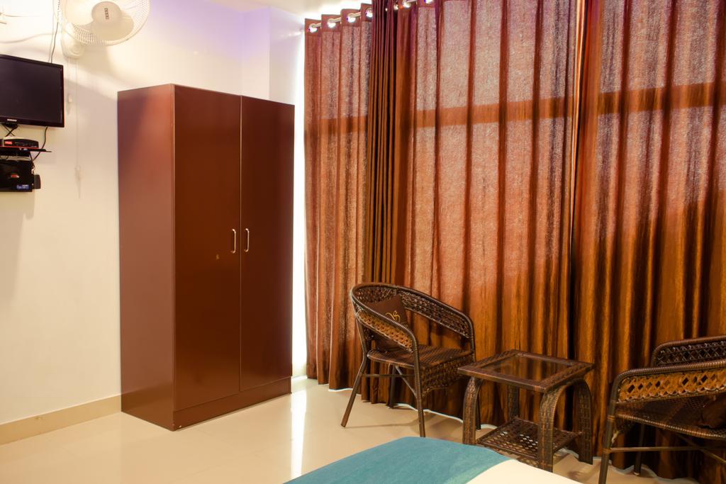 The Signature Inn Μπανγκαλόρ Δωμάτιο φωτογραφία