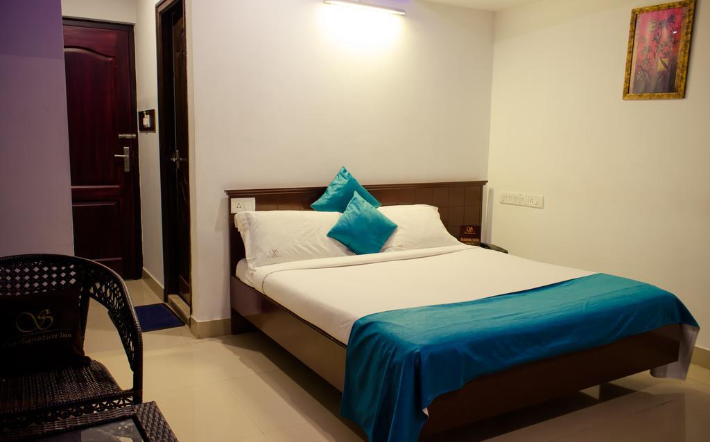 The Signature Inn Μπανγκαλόρ Δωμάτιο φωτογραφία